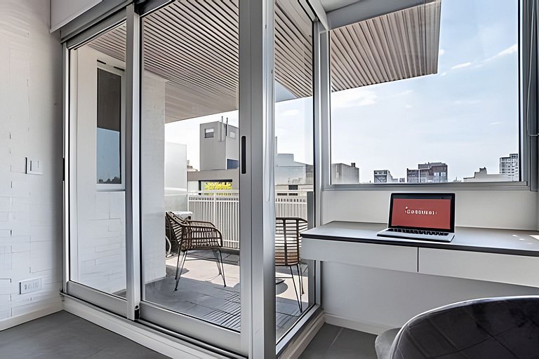 Moderno Studio con Gran Vista